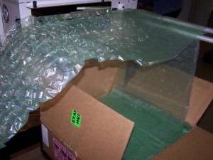 Compact Bubble Packaging on Demand sytem inflates and seals bags as needed